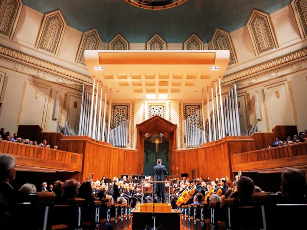 Watching performance inside Asheville Symphony