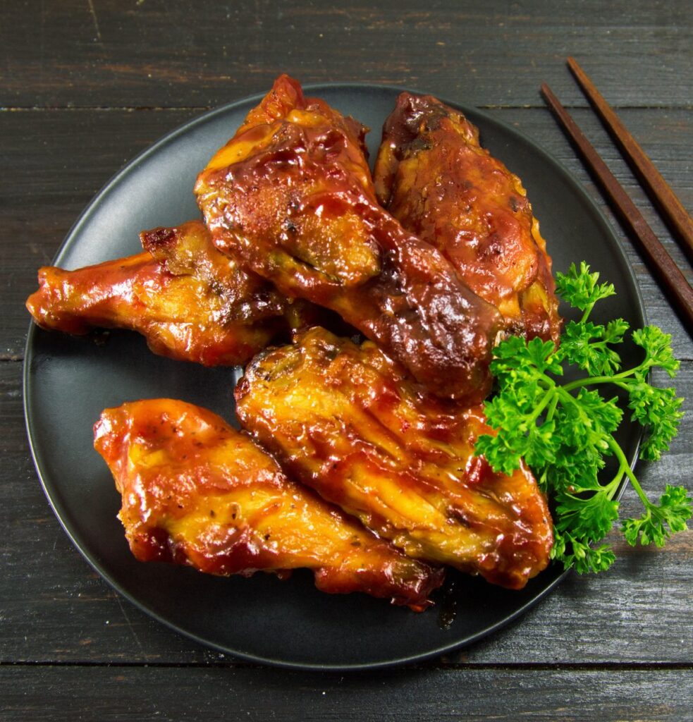 BBQ Chicken Wings at Pi-Squared Pizza Hendersonville NC - Image by Creative-Family from Getty Images